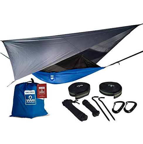 https://hips.hearstapps.com/vader-prod.s3.amazonaws.com/1652971751-car-camping-hammock-1652971731.png?crop=1xw:1xh;center,top&resize=980:*