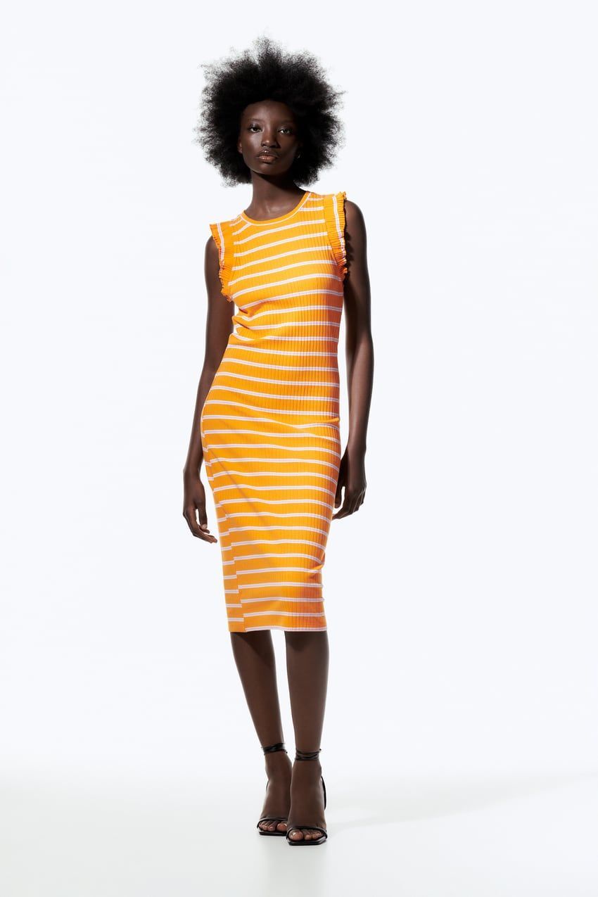 10 vestidos de rayas para crear un look de oficina asequible