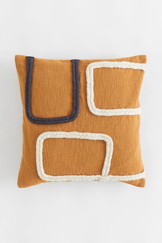 Appliquéd cushion cover