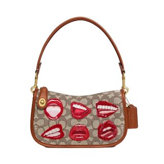 X Coach Tom Wesselmann Swinger in the signature woven Jacquard