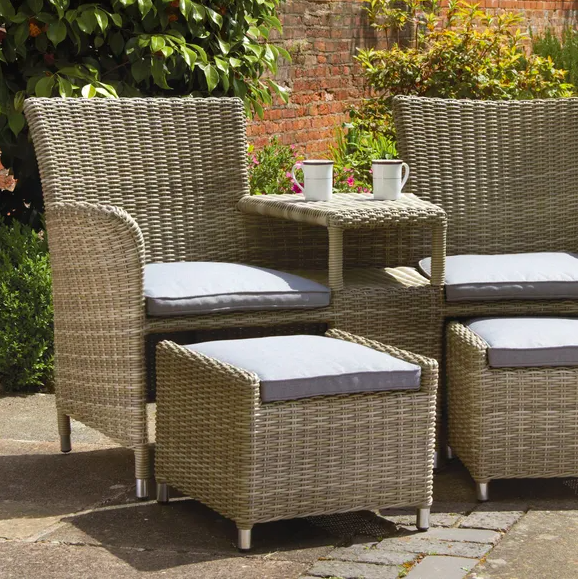 two rattan garden chairs