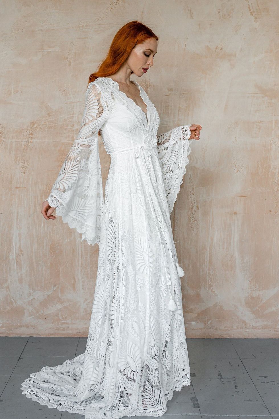 Lace boho wedding dress with long wide sleeves