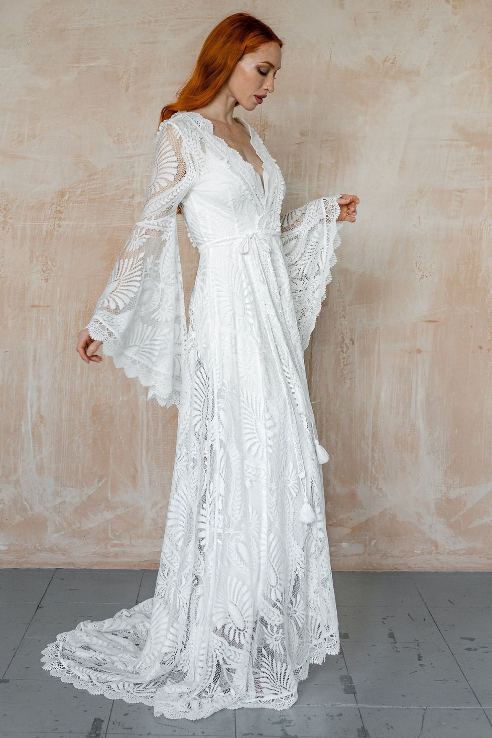 Lace boho wedding dress with long wide sleeves