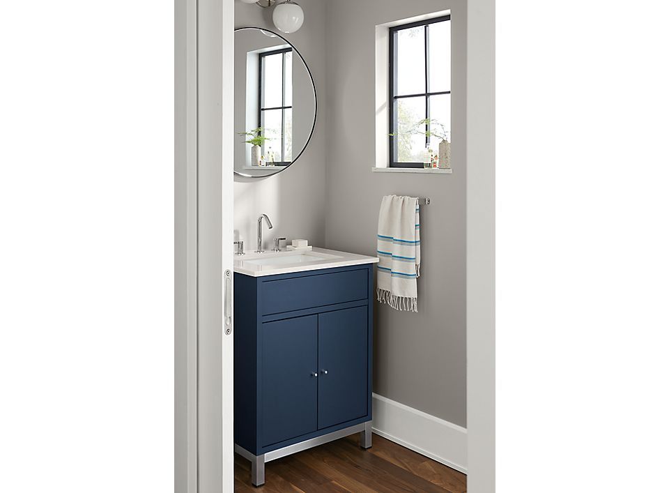 Shallow bathroom sink cabinet