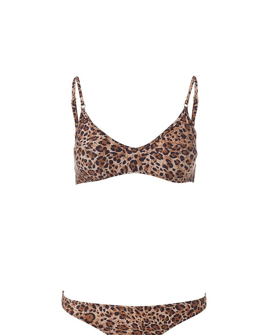 Davina McCall, 54, flashes toned core in leopard bikini