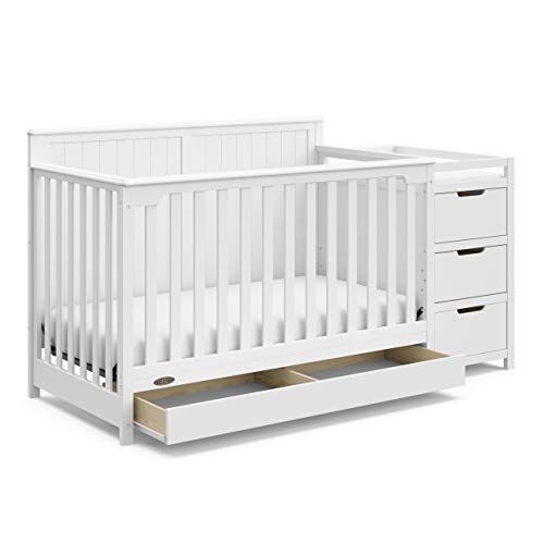 Crib with storage and changing outlet table