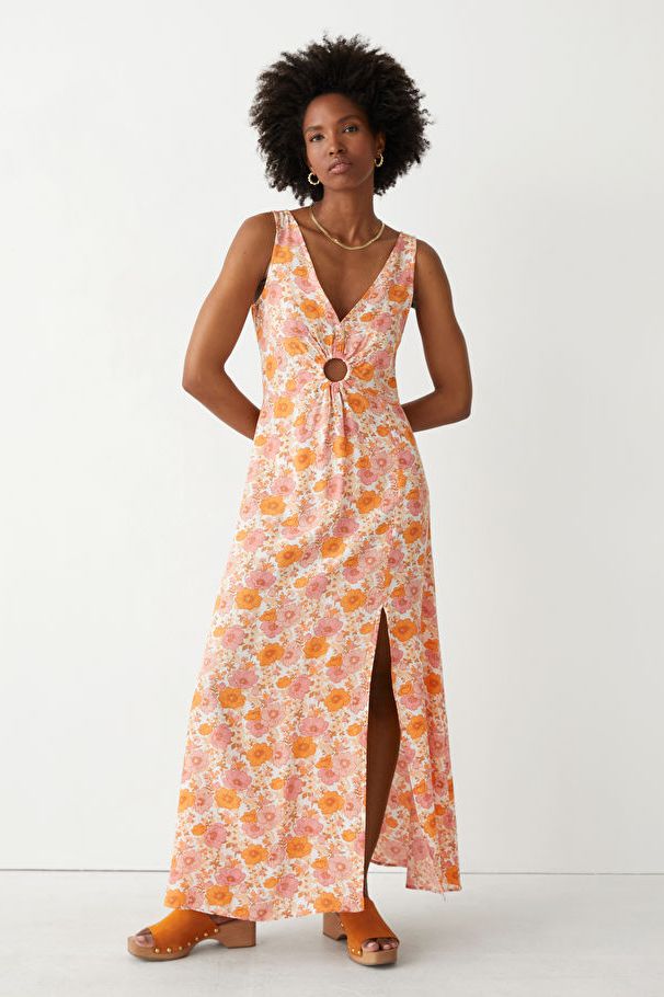 Printed Sleeveless Maxi Dress: Cut out dresses