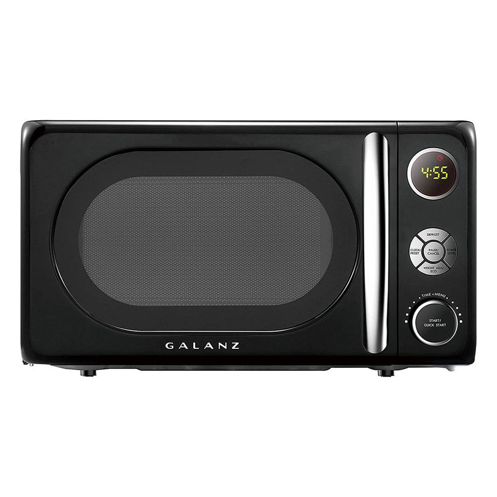 https://hips.hearstapps.com/vader-prod.s3.amazonaws.com/1662051720-microwave-oven-with-pull-handle-design-1662051713.jpg?crop=1xw:1xh;center,top&resize=980:*