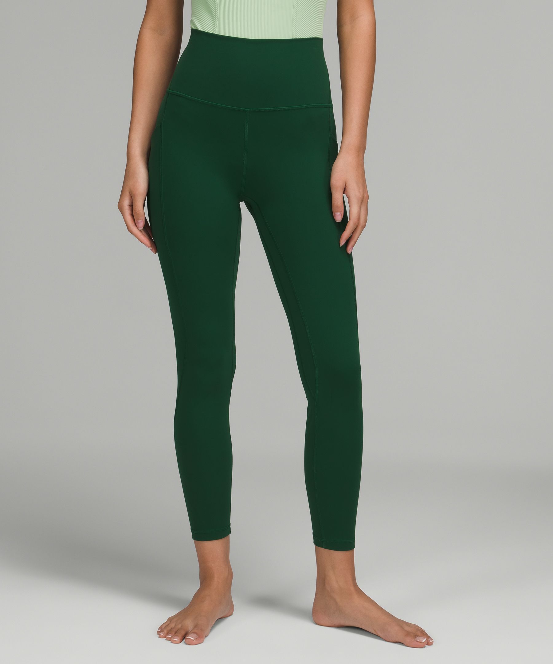 Nike Universa Women's Medium-Support High-Waisted 7/8 Leggings with Pockets.  Nike IN