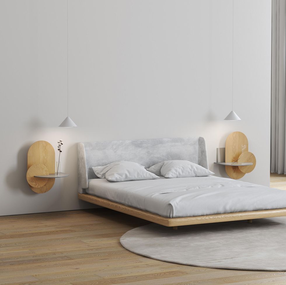 https://hips.hearstapps.com/vader-prod.s3.amazonaws.com/1663354136-woodendot-storage-modular-bedside-table-oak-grey-oval-bed-perspective-h1-master-1663354115.jpg?crop=0.752xw:1.00xh;0.144xw,0&resize=980:*