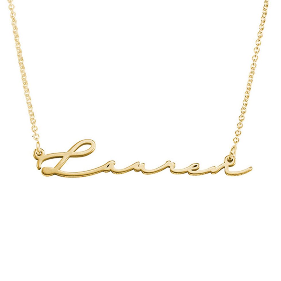 https://hips.hearstapps.com/vader-prod.s3.amazonaws.com/1664827332-signature-style-name-necklace-gold-plated-12.jpg?crop=1xw:1.00xh;center,top&resize=980:*