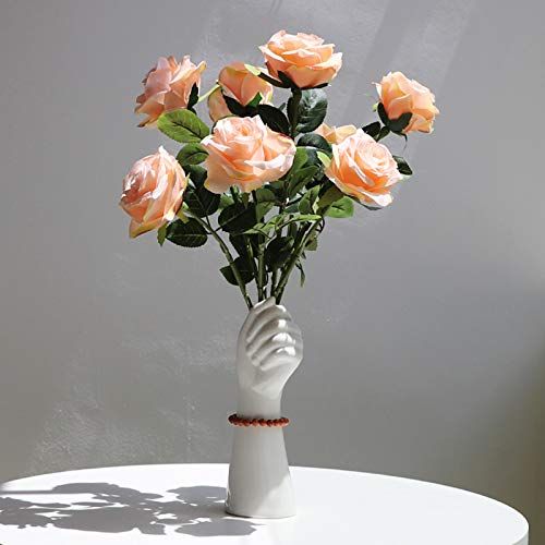 Hand Holding Flower Vase