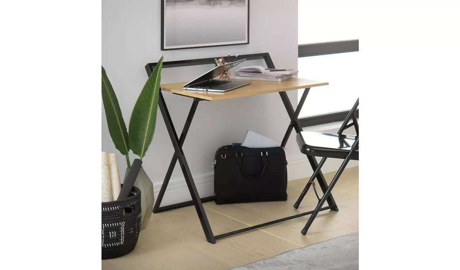 Black fold away table and online chairs