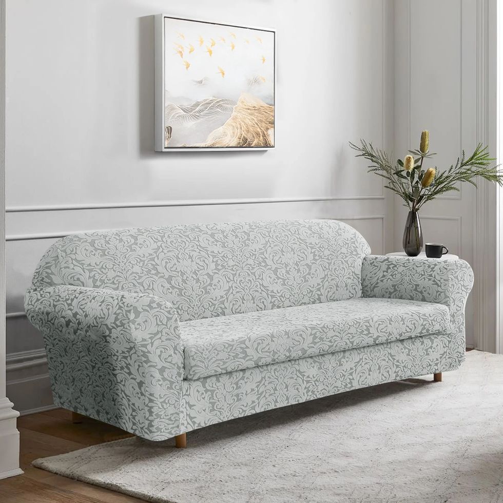 https://hips.hearstapps.com/vader-prod.s3.amazonaws.com/1666121174-damask-printed-soft-stretchy-box-cushion-sofa-slipcover-1666121164.jpg?crop=1xw:1xh;center,top&resize=980:*