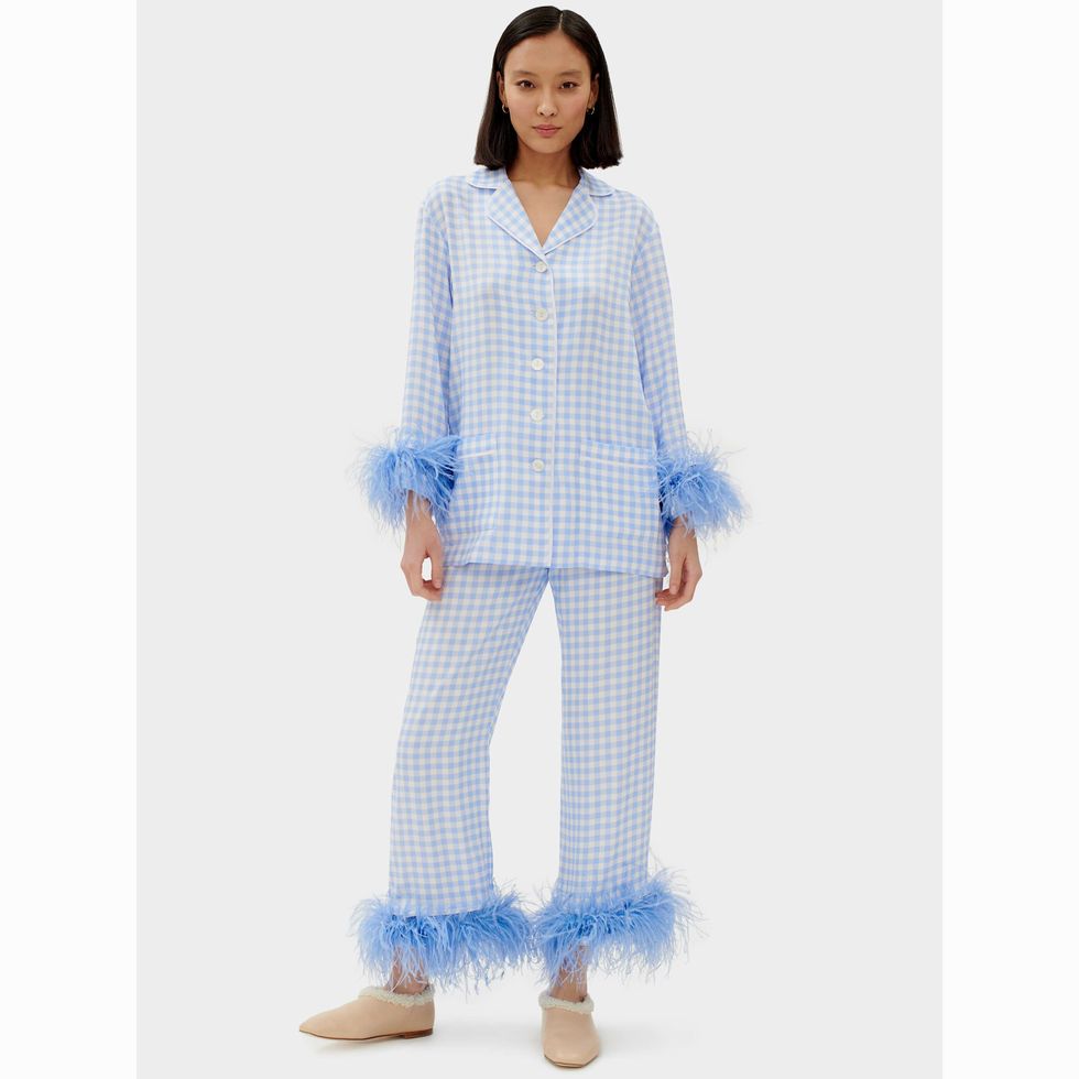 https://hips.hearstapps.com/vader-prod.s3.amazonaws.com/1667241996-sleeper-sh2257p-party-pajama-set-with-feathers-in-blue-vichy-370-6-2304x3460-1667241983.jpg?crop=1xw:1xh;center,top&resize=980:*