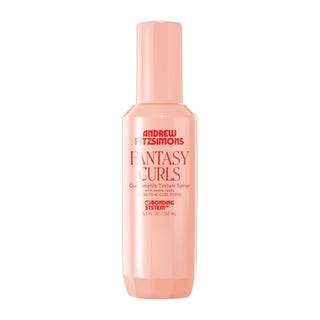 Curl-defining spray with castor oil for a natural bounce