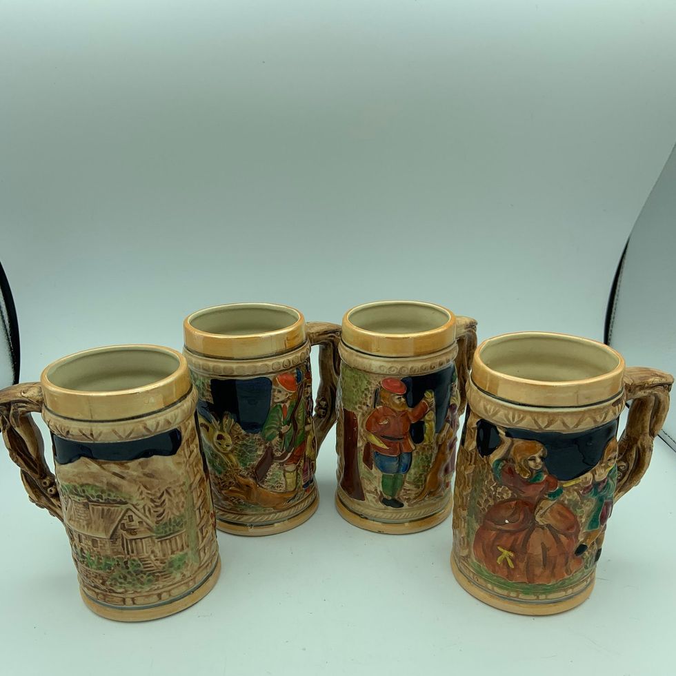 Set of Four Vintage Ceramic Beer Steins