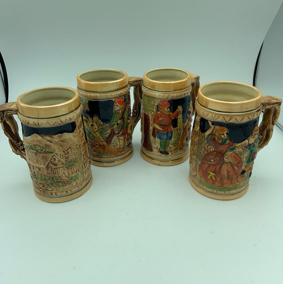 Set of Four Vintage Ceramic Beer Steins