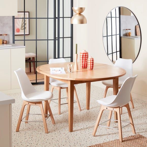 Small dining table that deals extends to seat 12