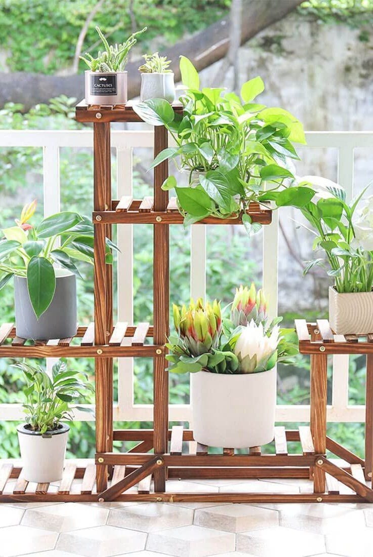 20. Unho Wooden Plant Display Stand