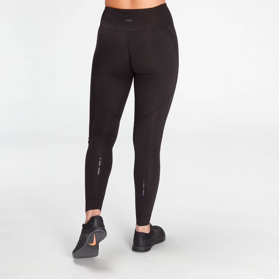 Women's size XS black and gold Under Armour leggings. Excellent