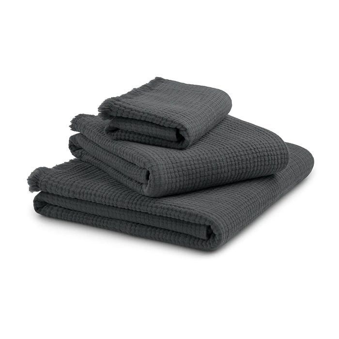https://hips.hearstapps.com/vader-prod.s3.amazonaws.com/1675448487-tag_four_layer_towel_collection_charcoal_1_1.jpg?crop=1xw:1.00xh;center,top&resize=980:*