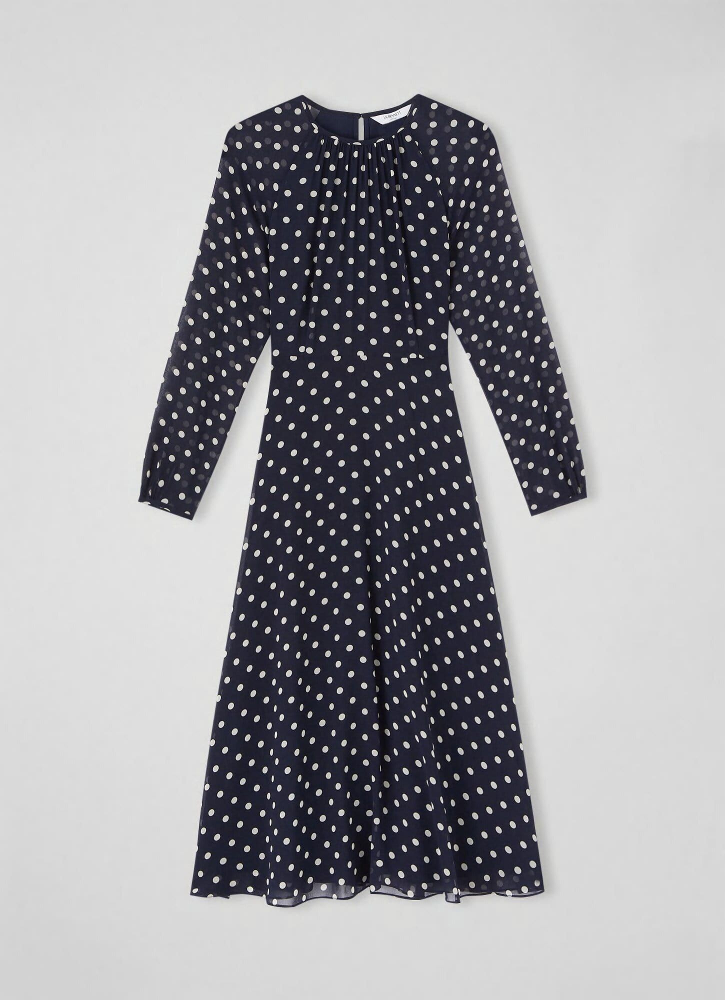 Cream dress clearance with black spots