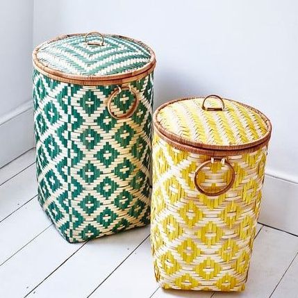 Yellow rattan woven laundry basket