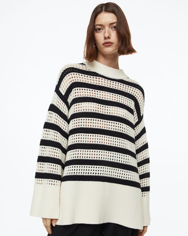 Oversized hole-knit jumper
