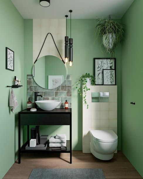 Baño verde con espejo de baño redondo Vintage