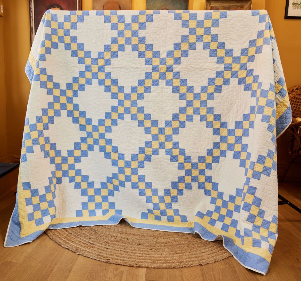 blue and white and yellow checkered quilt