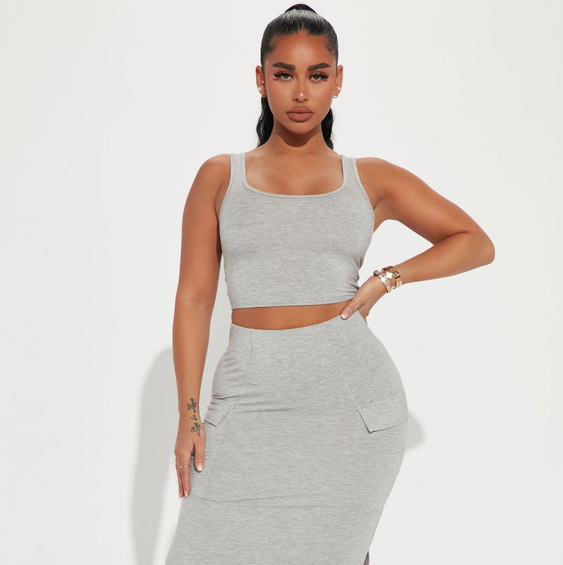 Kim Kardashian Brought Back a Y2K Trend in a Bra and High Slit Skirt