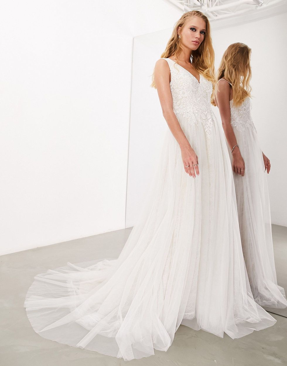 Sienna bead and embroidered plunge bodice wedding dress with lace underlay in ivory