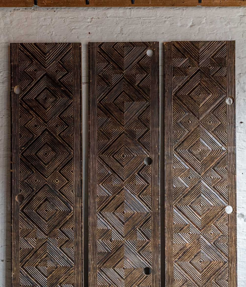 Hand-carved geometric panels 