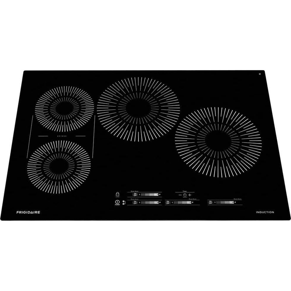 https://hips.hearstapps.com/vader-prod.s3.amazonaws.com/1681415001-black-frigidaire-induction-cooktops-fcci3027ab-64_1000.jpg?crop=1xw:1.00xh;center,top&resize=980:*