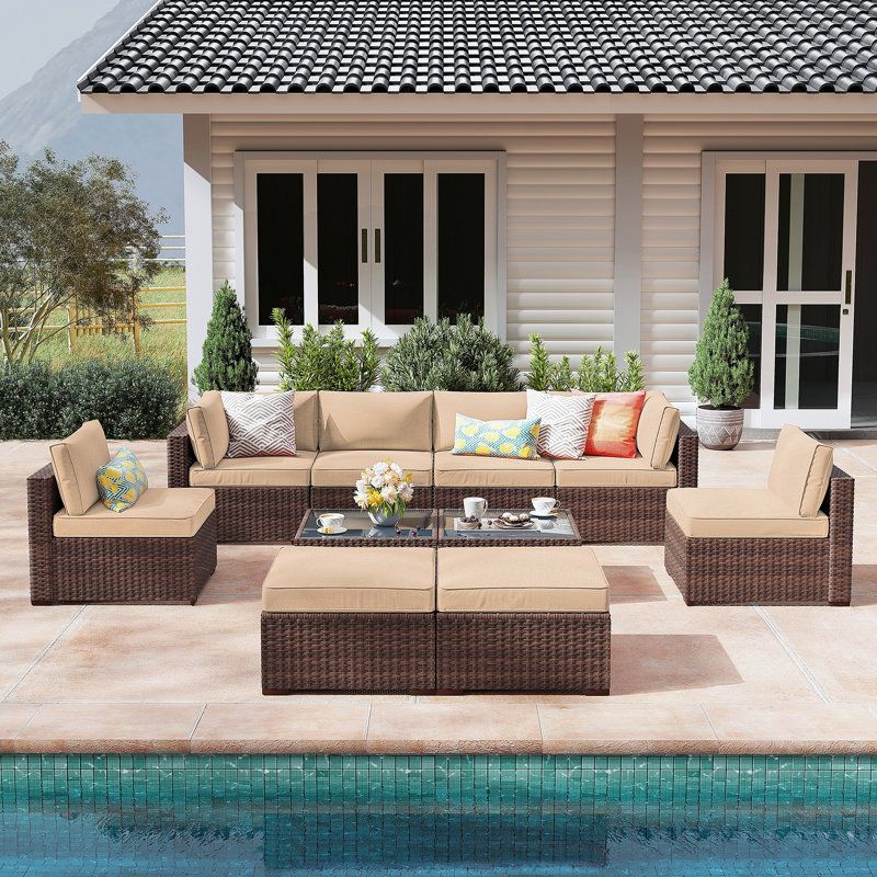 10 Piece Rattan Sectional Seating Group with Cushions