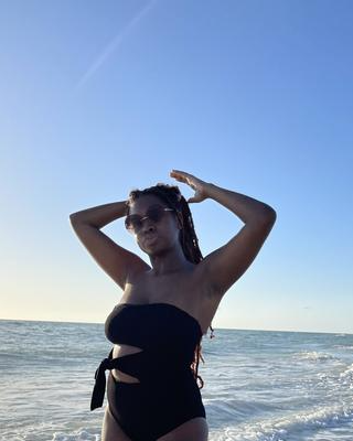 Sleek and Chic: 16 Black Swimsuits for the Beach Minimalist