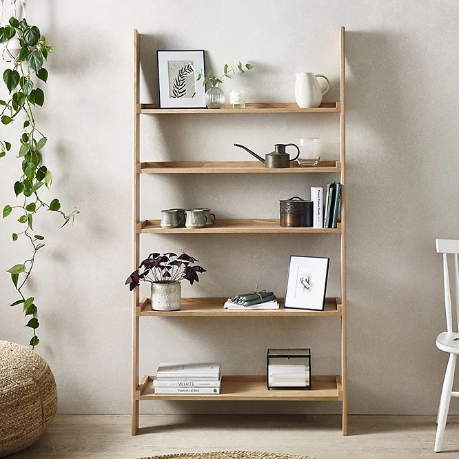 Leaning shelf deals with drawers