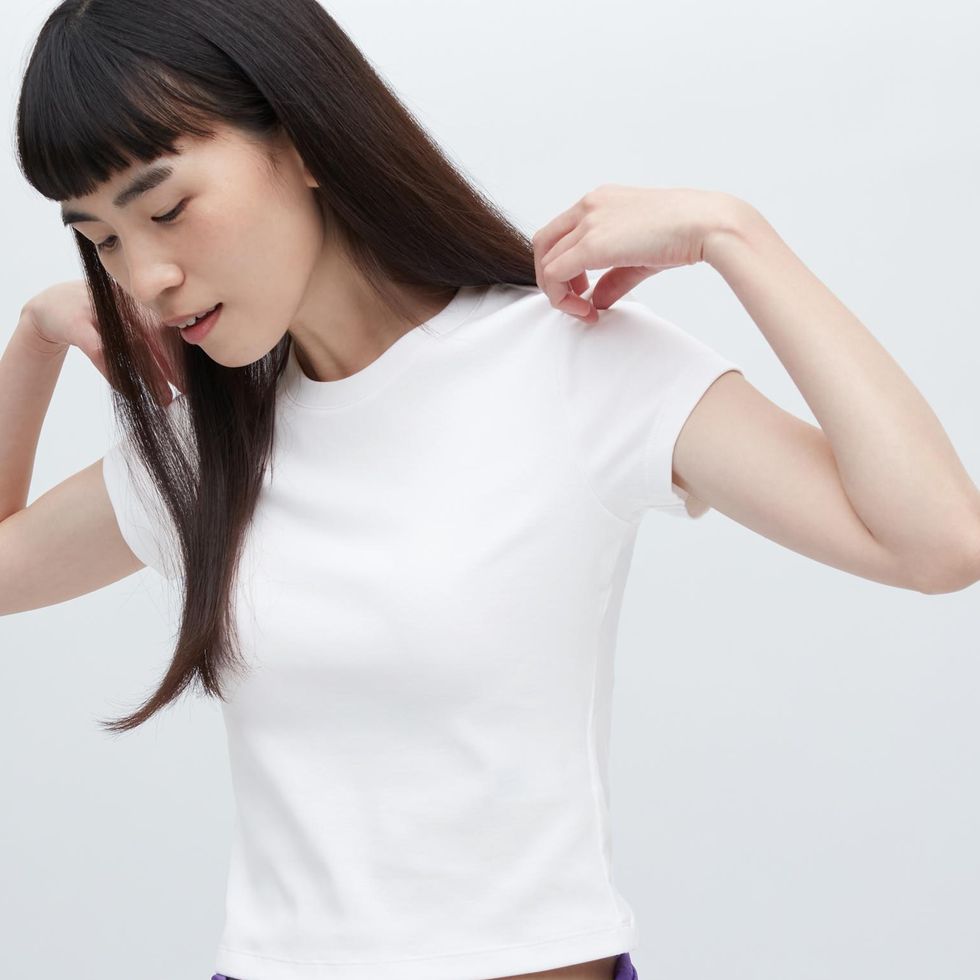 Premium Photo  Female model wearing white t-shirt and panties in