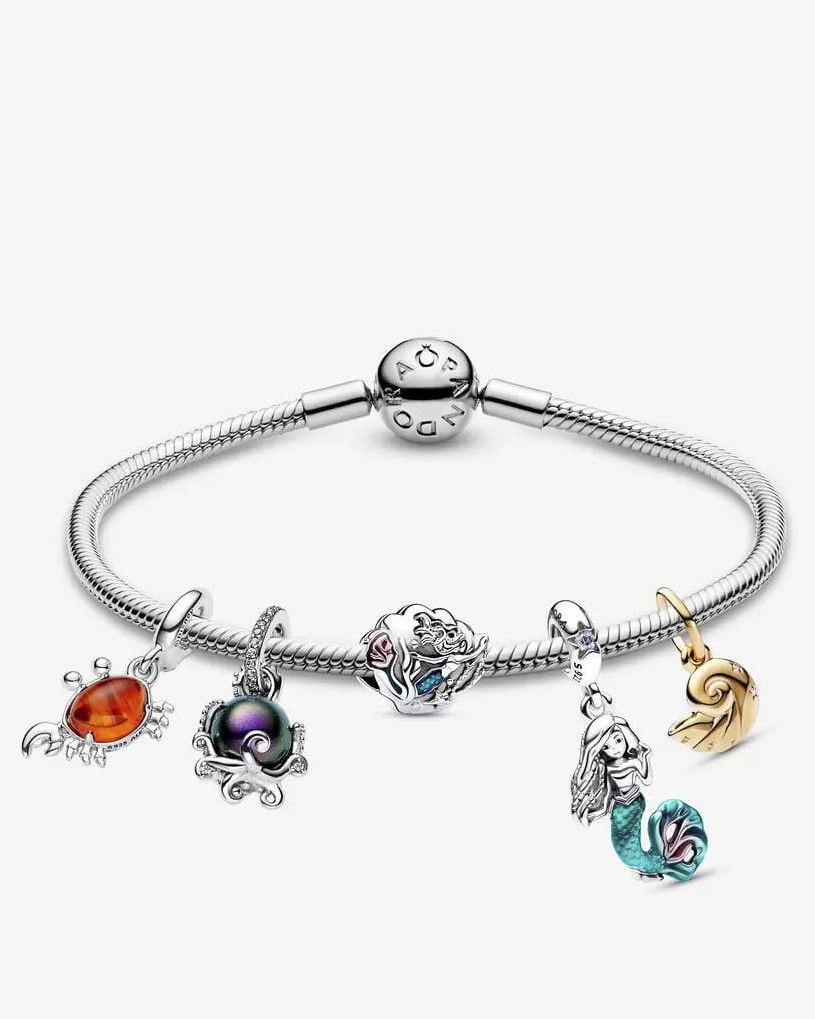 Genuine Pandora charm bracelet with 3 spacers and 5 bead charms