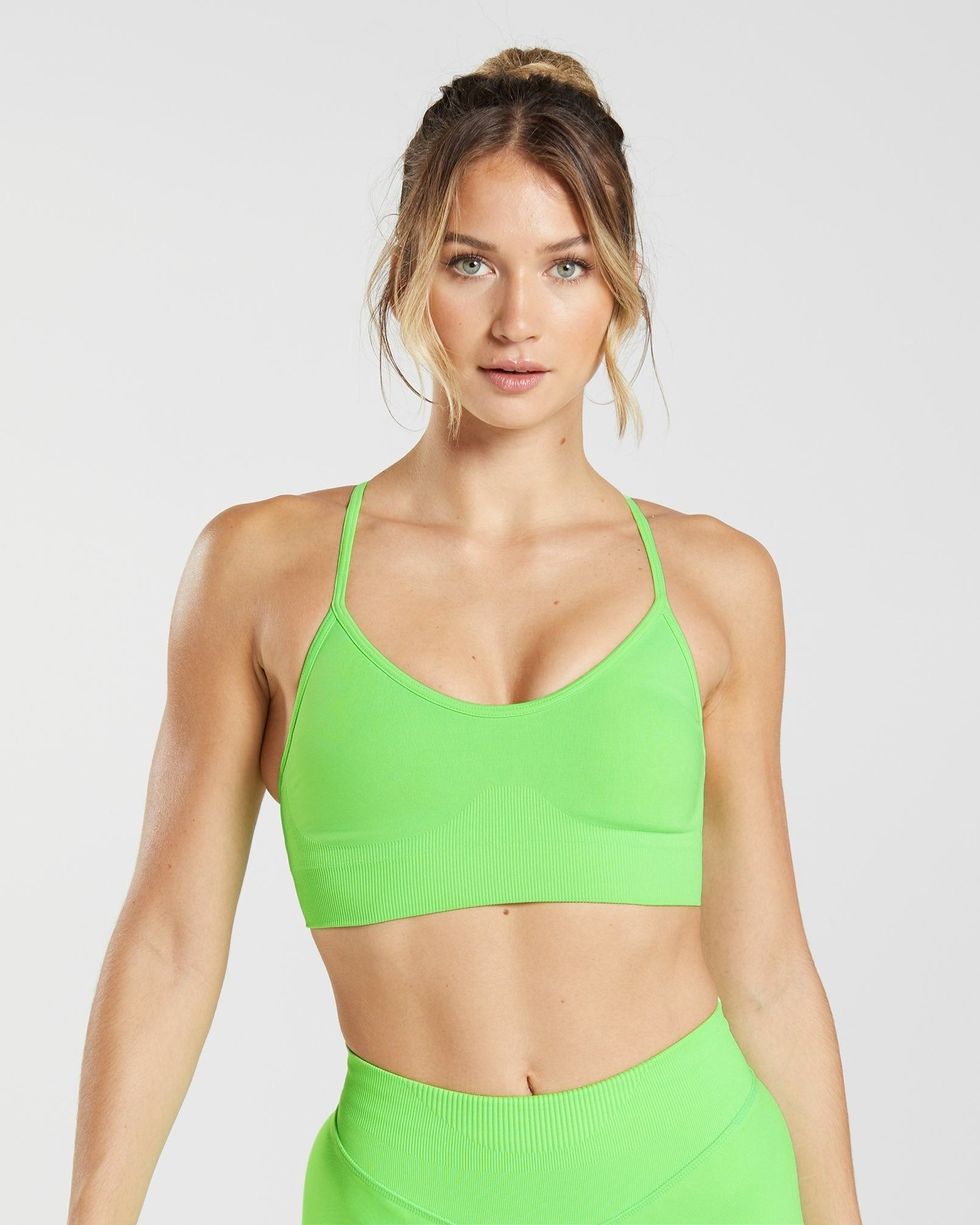 We need Hailey Bieber's neon green sports bra (and her sauna too)