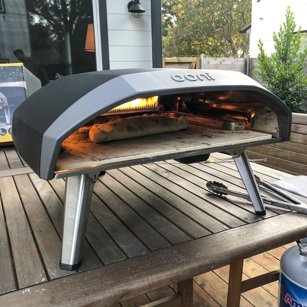Wood fired outdoor pizza ovens, accessories to heat up summer dining 