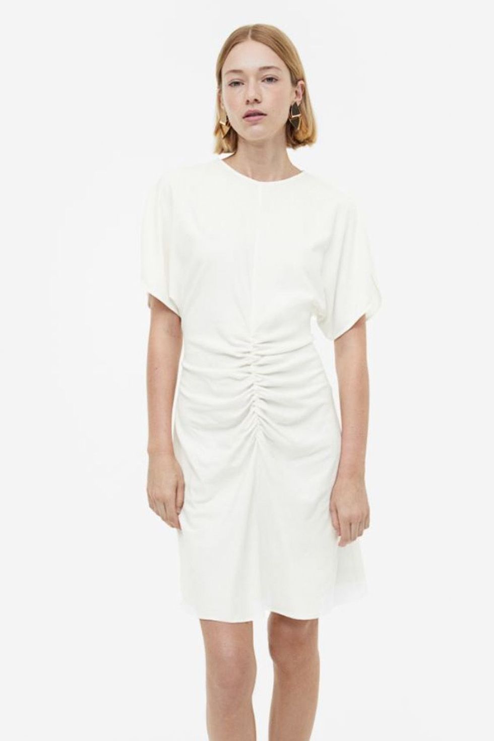 Vestido blanco midi con la espalda descubierta, el imprescindible del  verano que tienen Mango, Zara y H&M