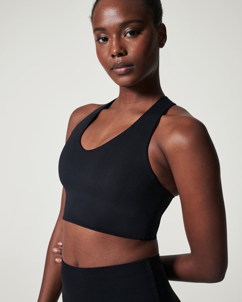 Reebok Lux mid support bra with racer back in black colour block