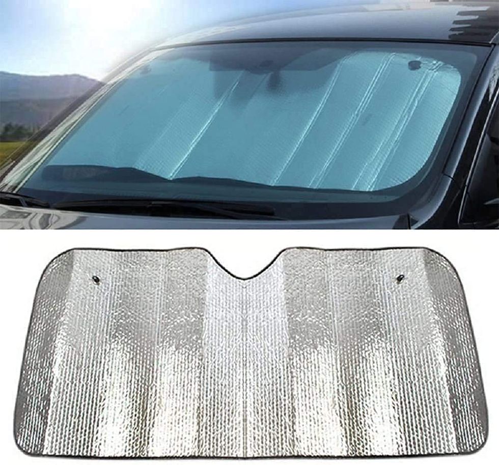 Foldable car windshield sunshade with suction cups