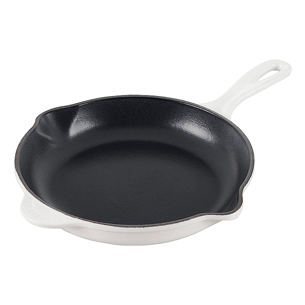 https://hips.hearstapps.com/vader-prod.s3.amazonaws.com/1688651388-le-creuset-classic-cast-iron-handle-skillet-64a6c66a9c40b.png?crop=1xw:1xh;center,top&resize=980:*