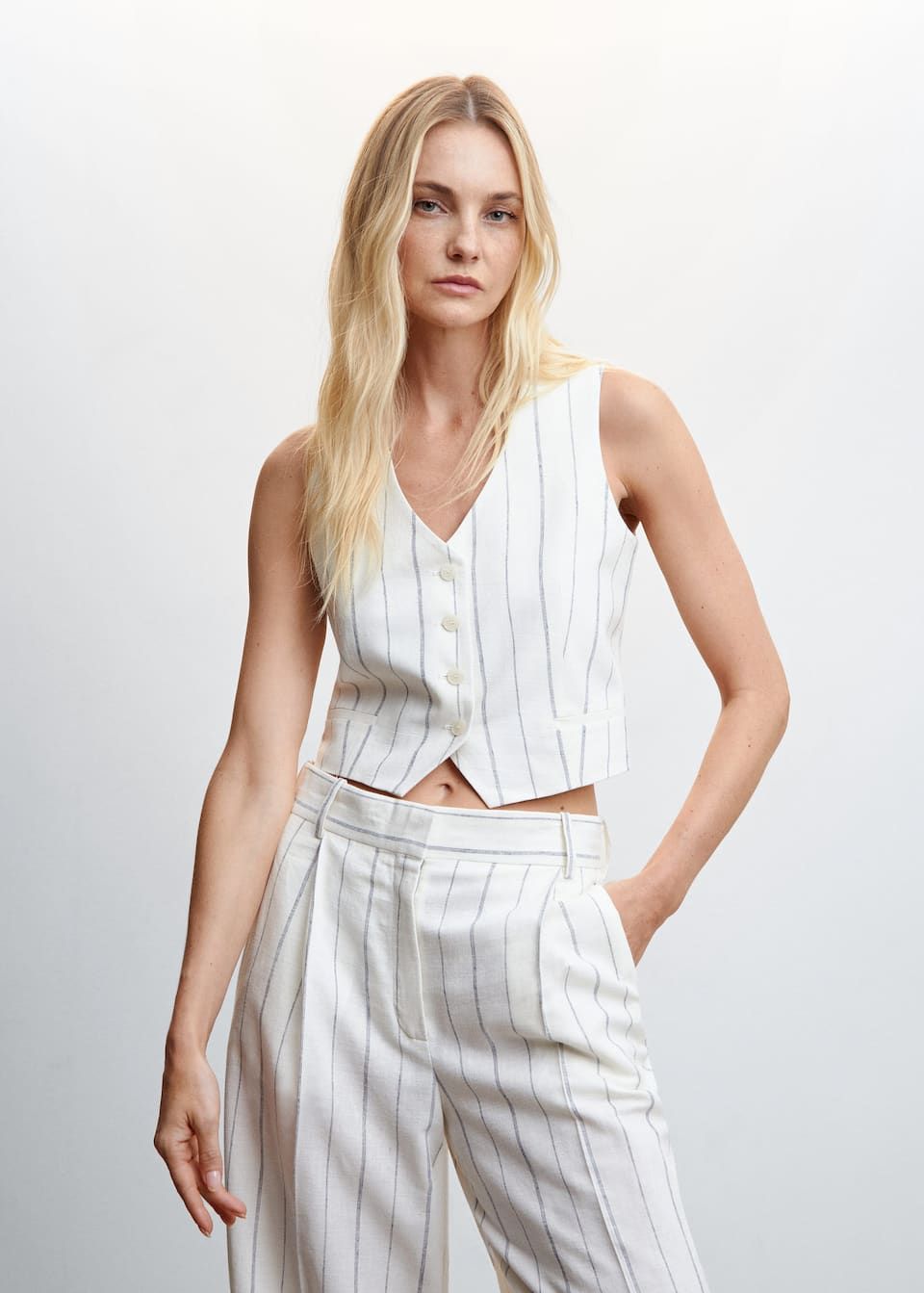 Female Mannequin In White Striped Suit Women White Color Waistcoat And  Trousers Copy Space Ladies Outfit Boutique Stock Photo Picture And  Royalty Free Image Image 95882538