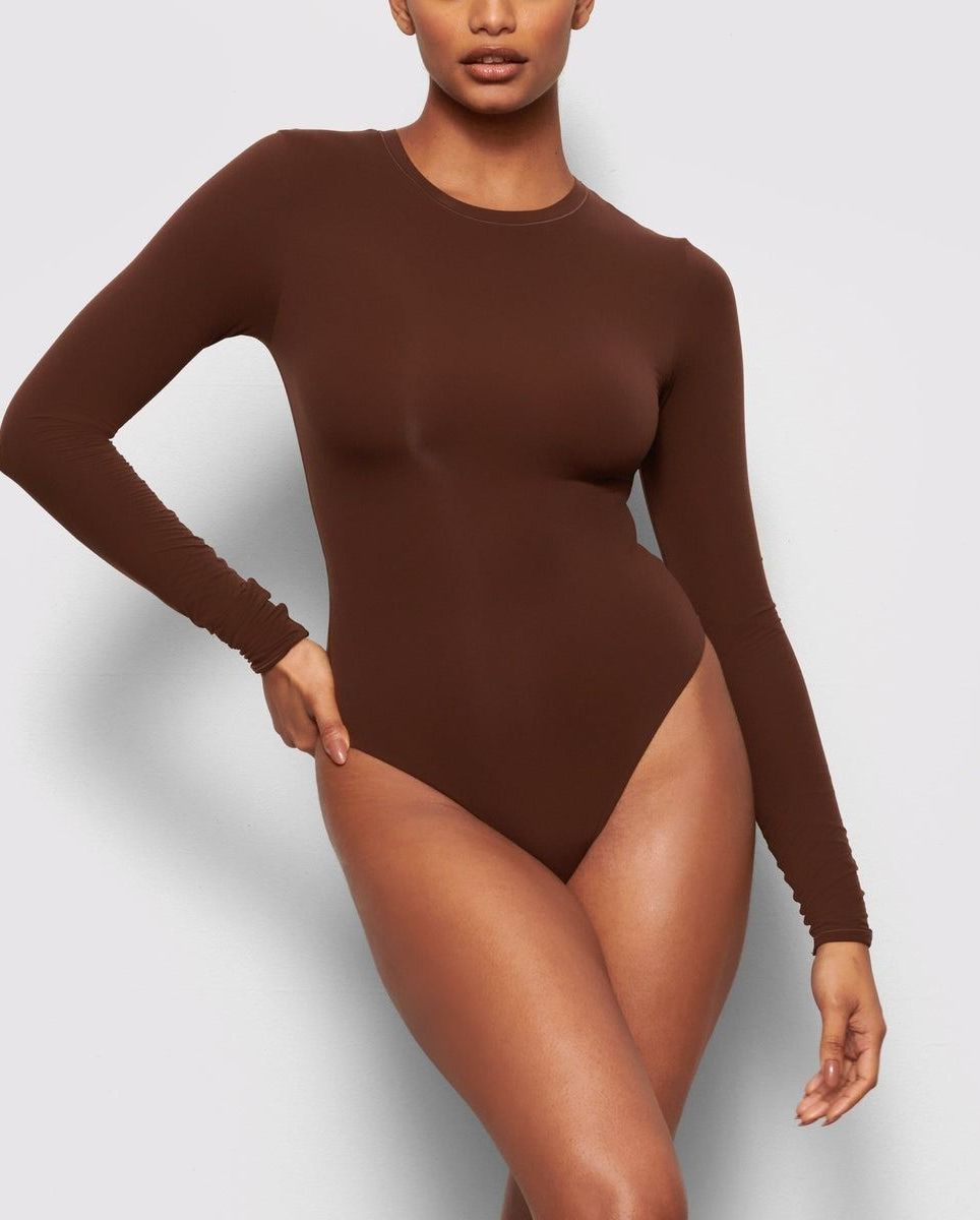 Kim Kardashian Smolders In Sheer Black Sculpted Bodysuit For