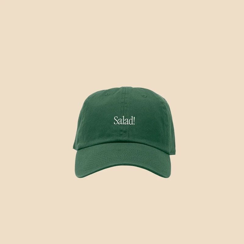 https://hips.hearstapps.com/vader-prod.s3.amazonaws.com/1689875278-1689280167-sweetgreen-salad-dad-hat-64b05ea198e2b.jpg?crop=1xw:1xh;center,top&resize=980:*