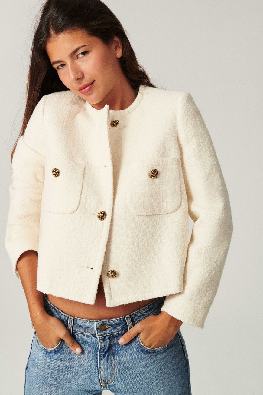 This crop tweed jacket is giving me big time Chanel vibes! It's a